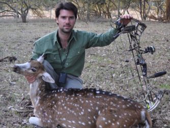 Witness the triumph of the season as this adventurer poses with his Patagonian deer.