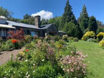 Immerse yourself in the lush surroundings of Red Stag Patagonia's lodges, where beautiful gardens create an idyllic ambiance.